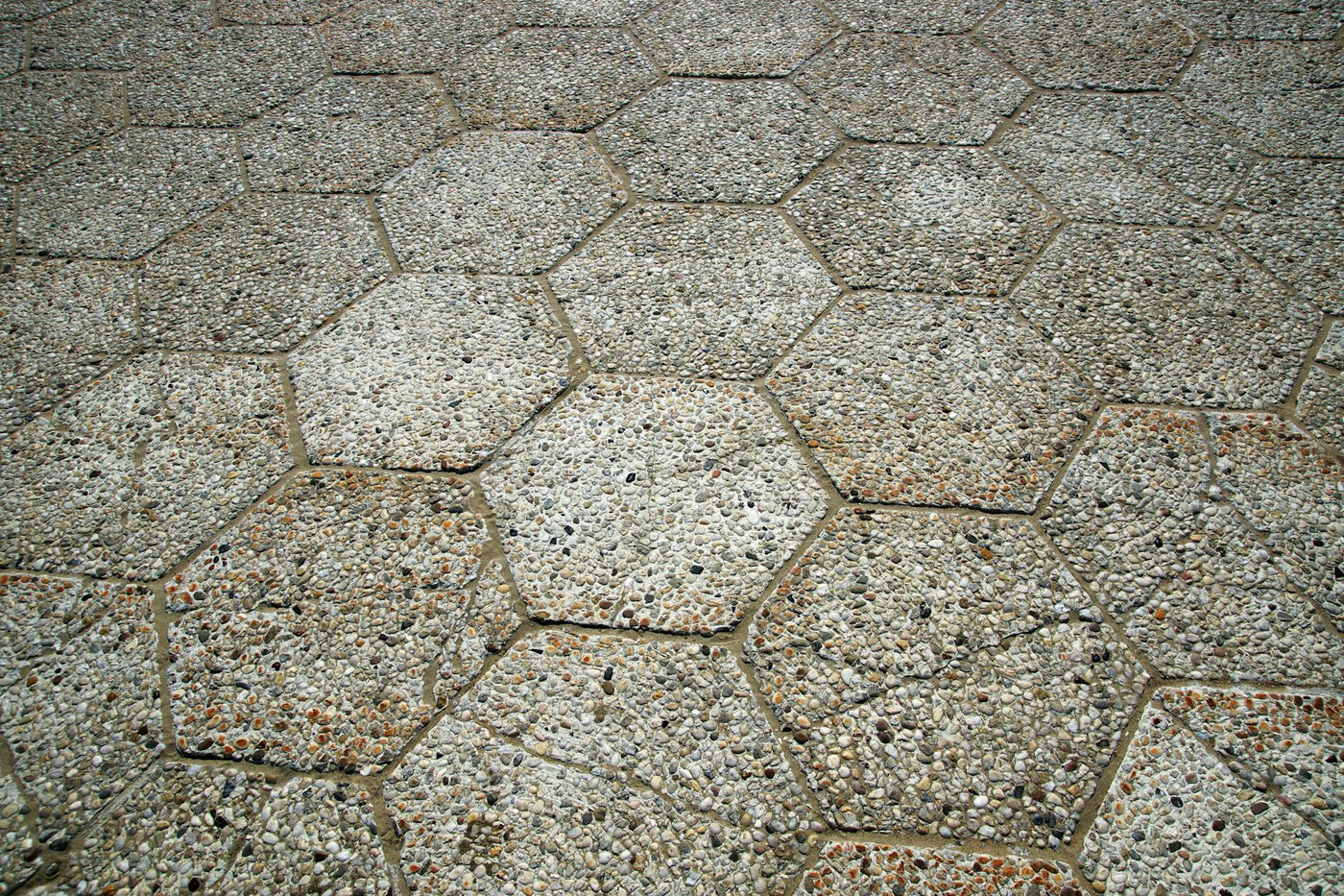 Close-up view of hexagonal stone pavement showcasing textures and patterns.